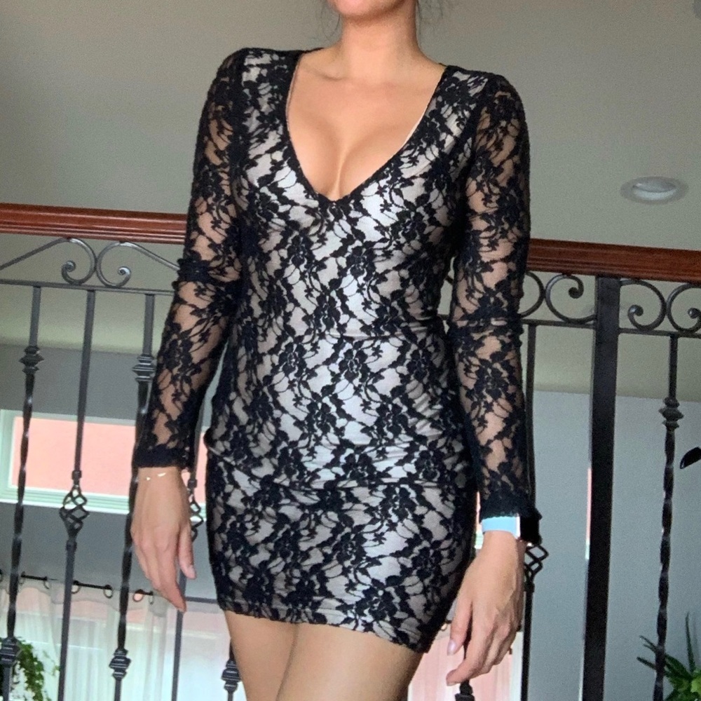 Black lace cocktail dress with nude underlay